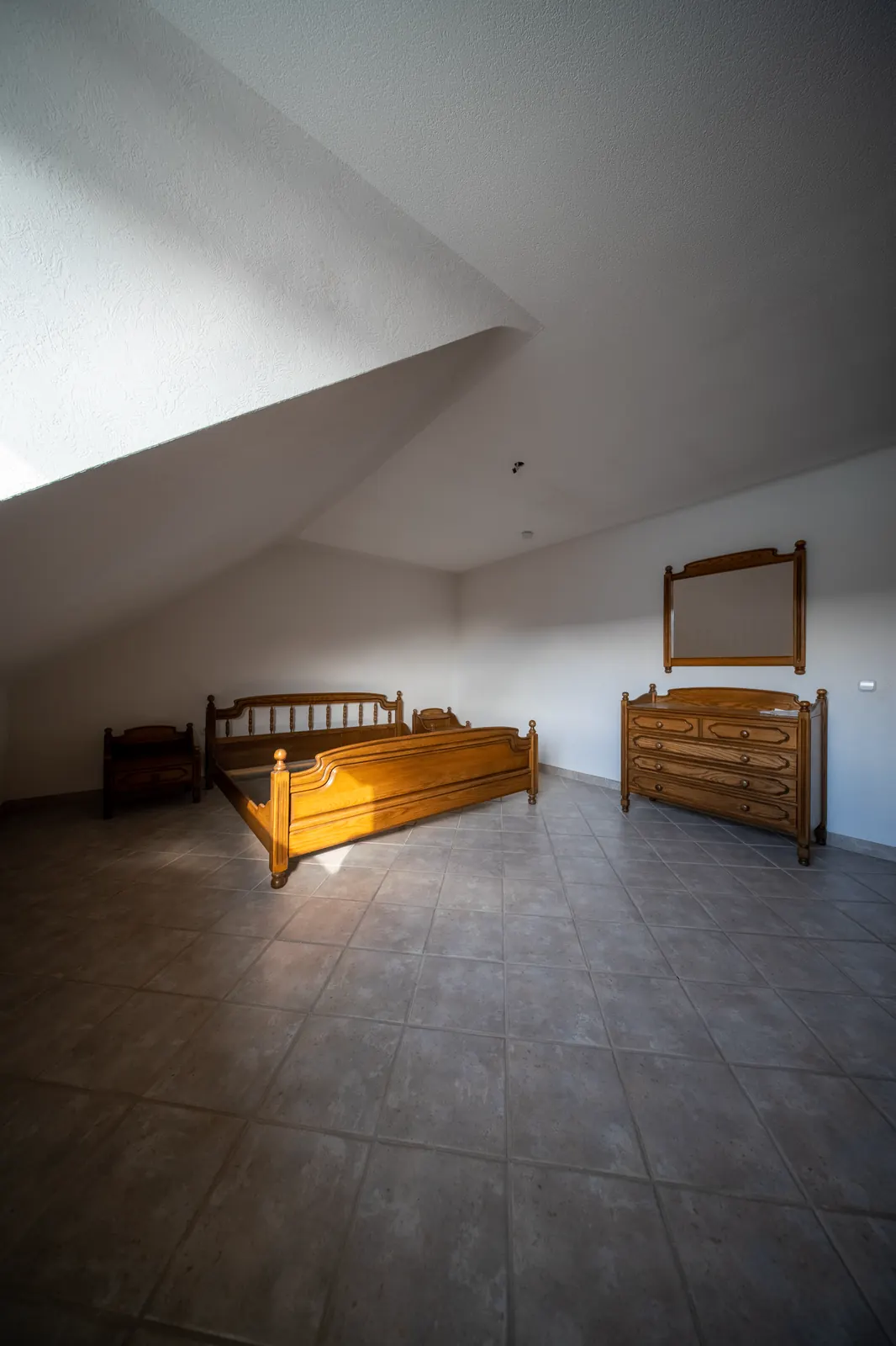 Schlafzimmer unter der Dachschräge